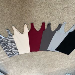 SOLD:Tank tops, stretchy one size fits all, reversible V or scoop neck